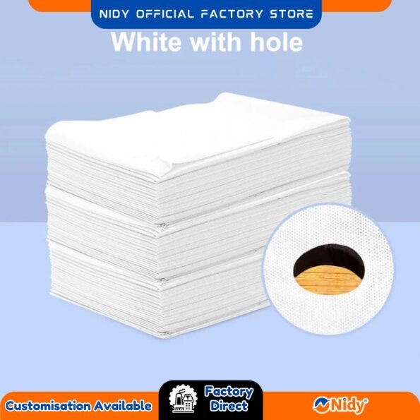 Premium disposable sheet with cutout, placed on massage table.