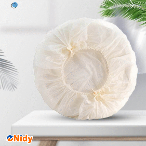 NIDY eco-friendly disposable caps sustainable hygiene solution.