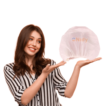 NIDY biodegradable disposable shower cap bulk pack.